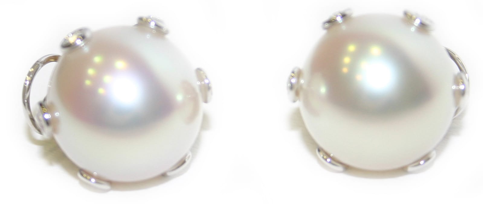 Royal Conch Pearl and Diamond Earrings by Hatta